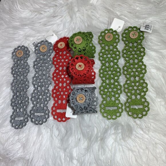 CRATE & Barrel 8 napkin rings  laser cut floral motif button closure NWT - Picture 2 of 7